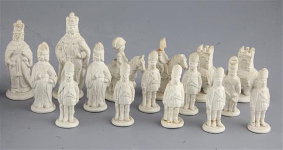 A Castleford type biscuit porcelain and basalt chess set, kings 3.25in.